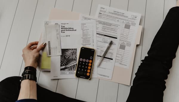 Person filling out property information form
